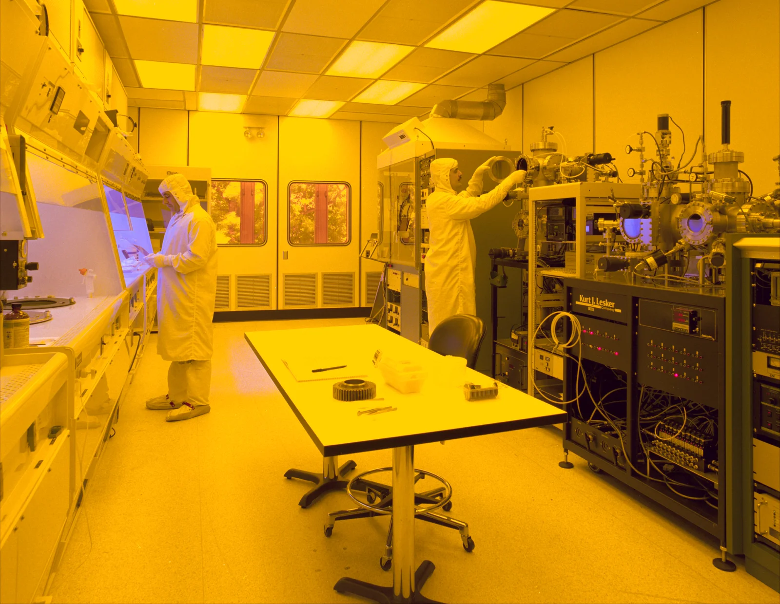 Semiconductor clean room fabrication facility with precision photolithography machinery